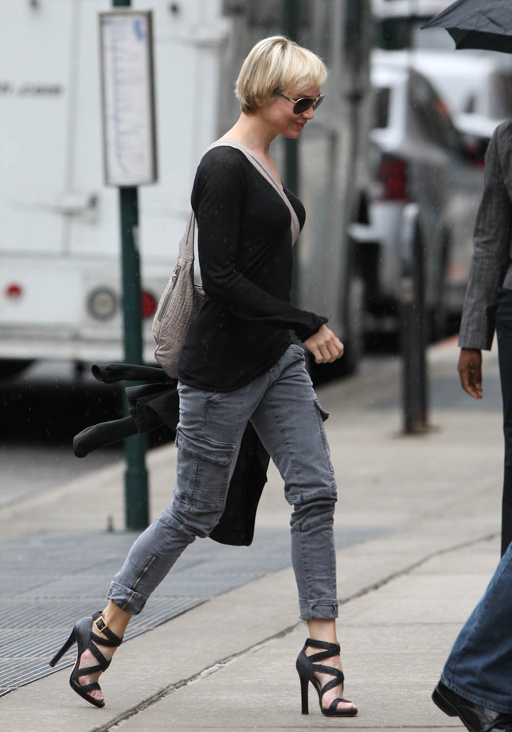 Renee Zelleweger in NYC with Bradley Cooper's family in 2010