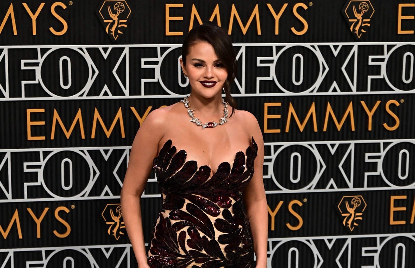 Selena Gomez arrives for the 75th Emmy Awards