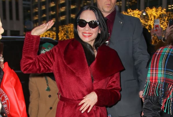 Lucy Liu: All the looks and the red coat
