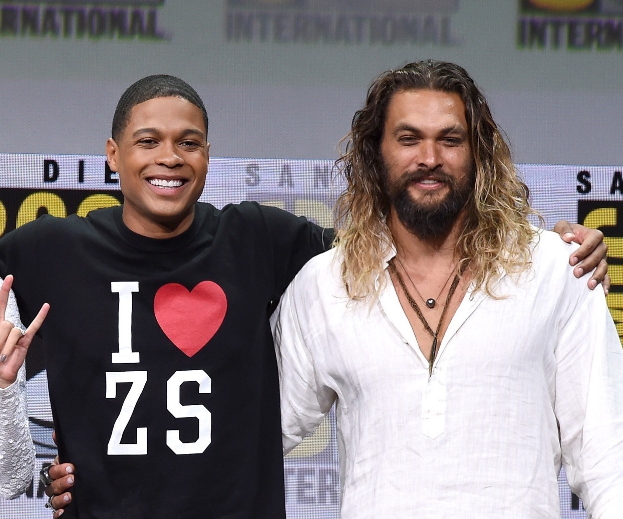 Jason Momoa stands with Ray Fisher