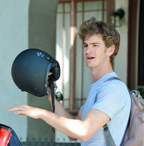 Andrew on a bike, Emma on the carpet