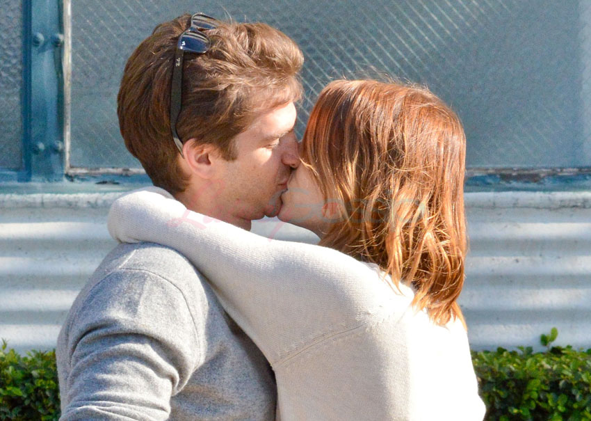 Emma & Andrew happy and kissing