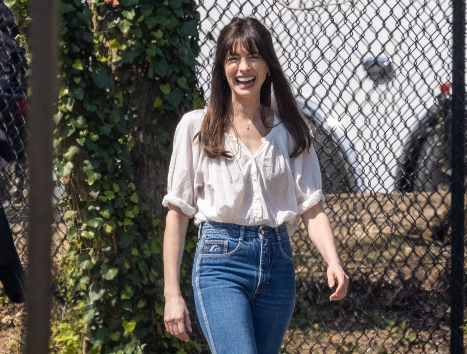 Anne Hathaway is outside, too