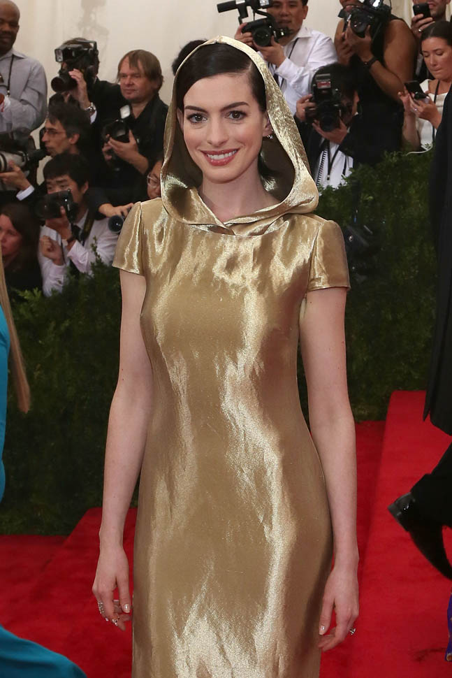 Anne Hathaway: Gold and hooded at the MET