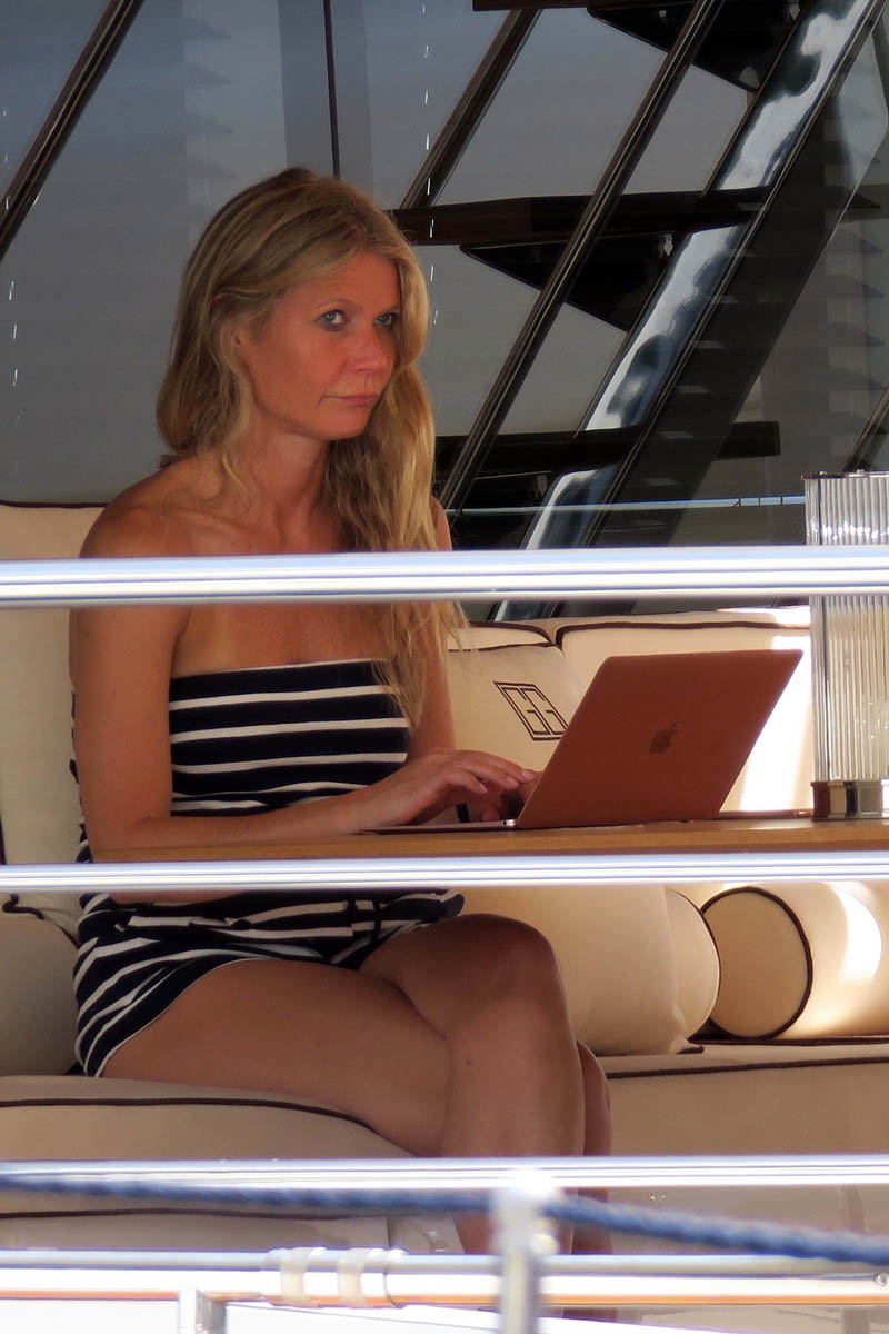 Gwyneth on holiday, Chris at home