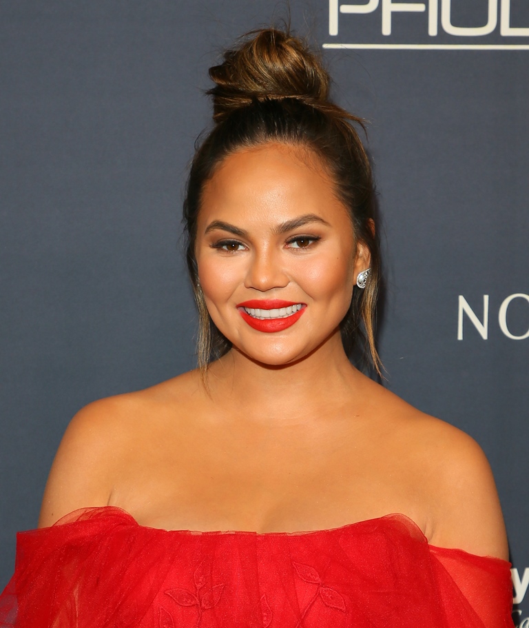 Chrissy Teigen, turkey, and Brussels sprouts