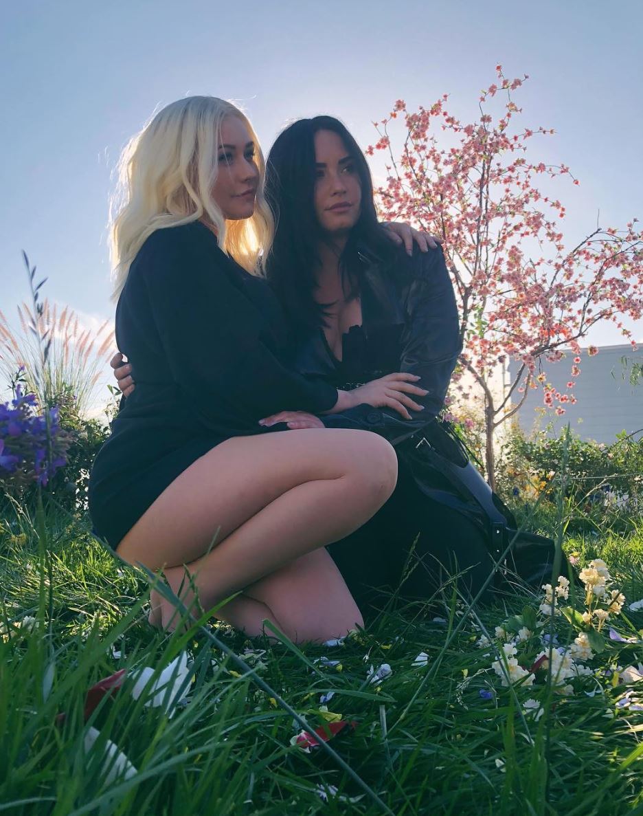 Xtina and Demi fall in line