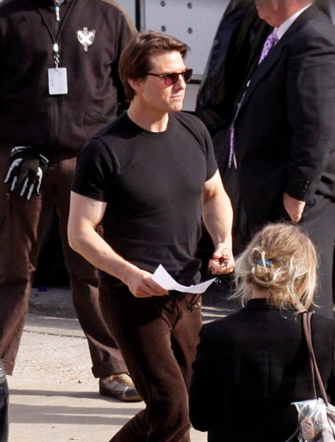 Tight shirt, tight pants, big hair