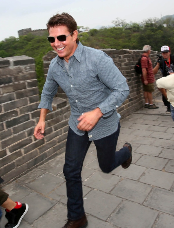 Tom Cruise runs the Great Wall of China
