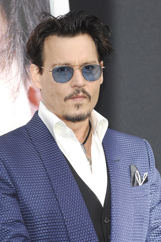Johnny Depp talks about elephants instead