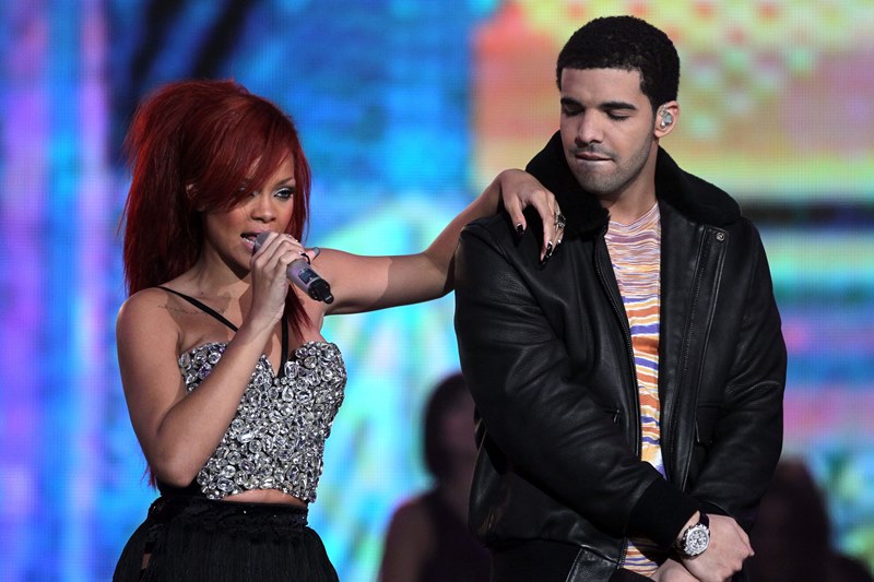 Rihanna and Drake holding hands