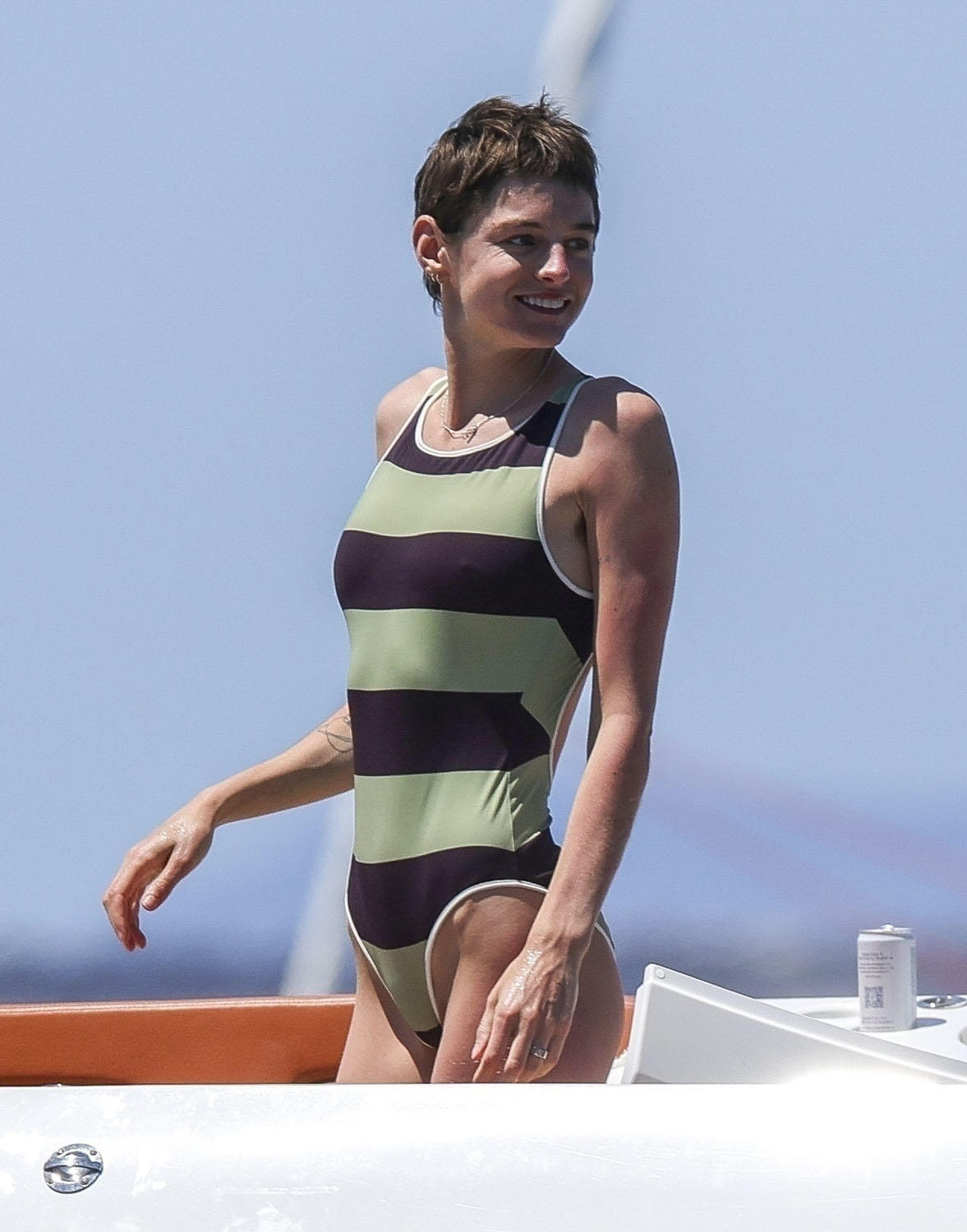 Emma Corrin swims in stripes