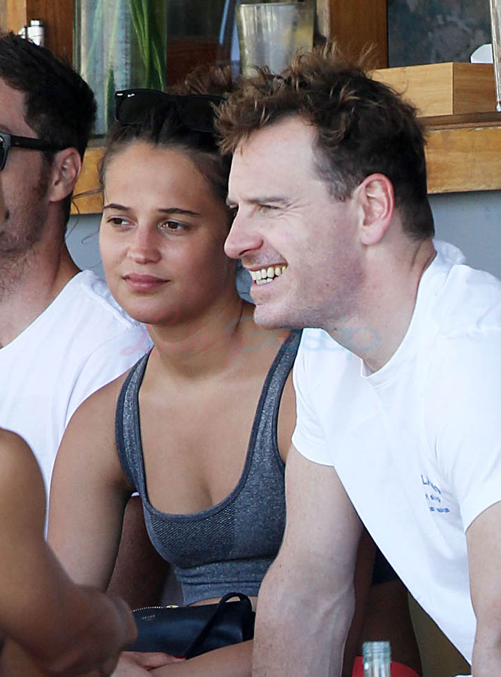 Michael Fassbender surfs with Alicia Vikander