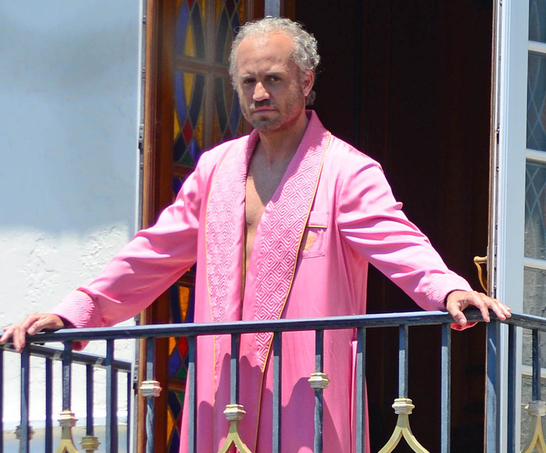 Versace in a pink robe