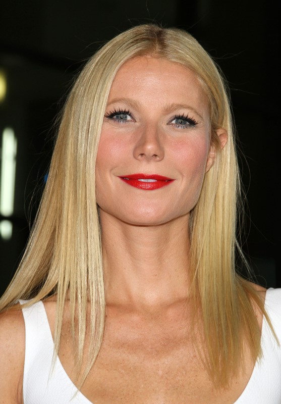 Gwyneth in white, red lips, and vaginas