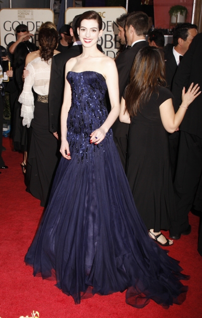Globes Rossum: Anne Hathaway