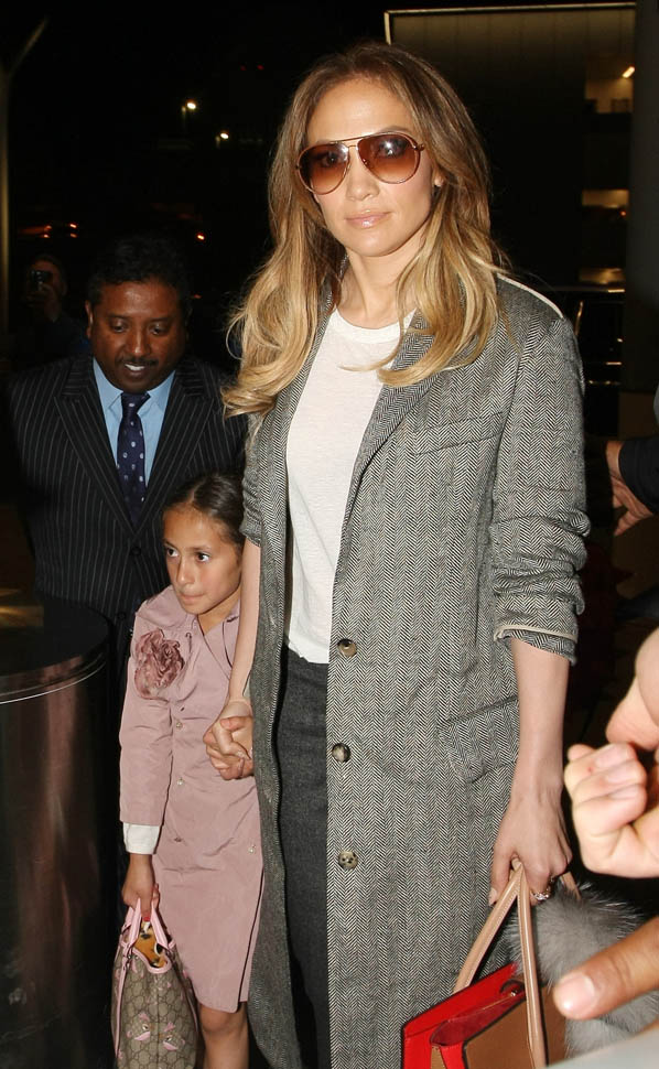 JLO’s airport kiss