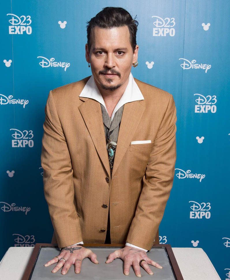 Johnny Depp: the rocker, the Sparrow, and the Mouse