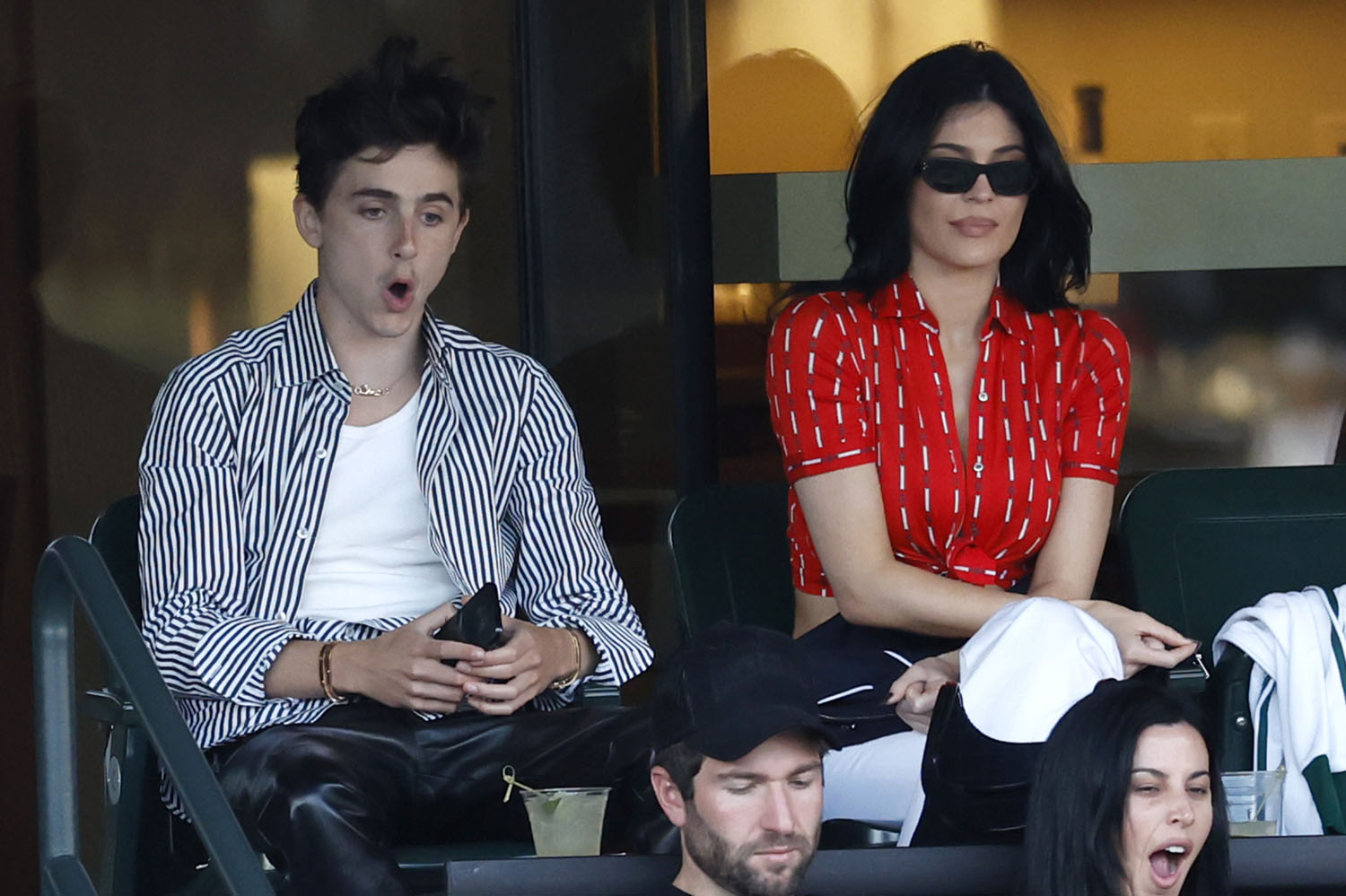Timmy and Kylie watch tennis