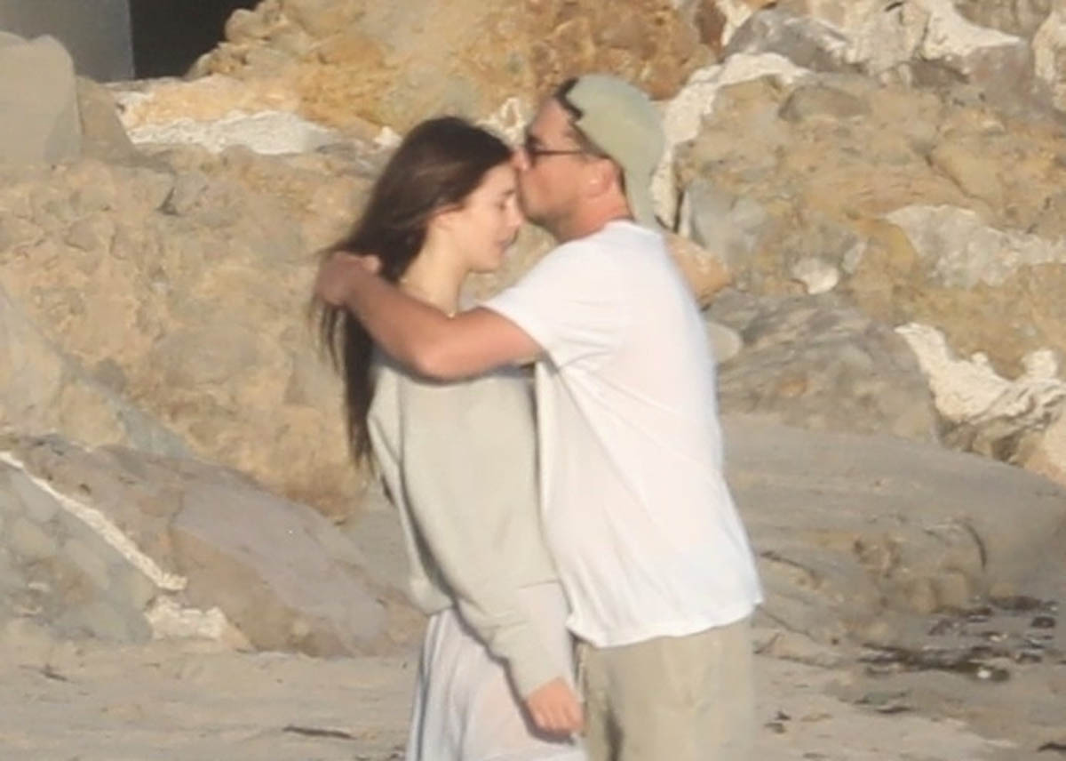 Leo and Camila: A Tender Beach Moment