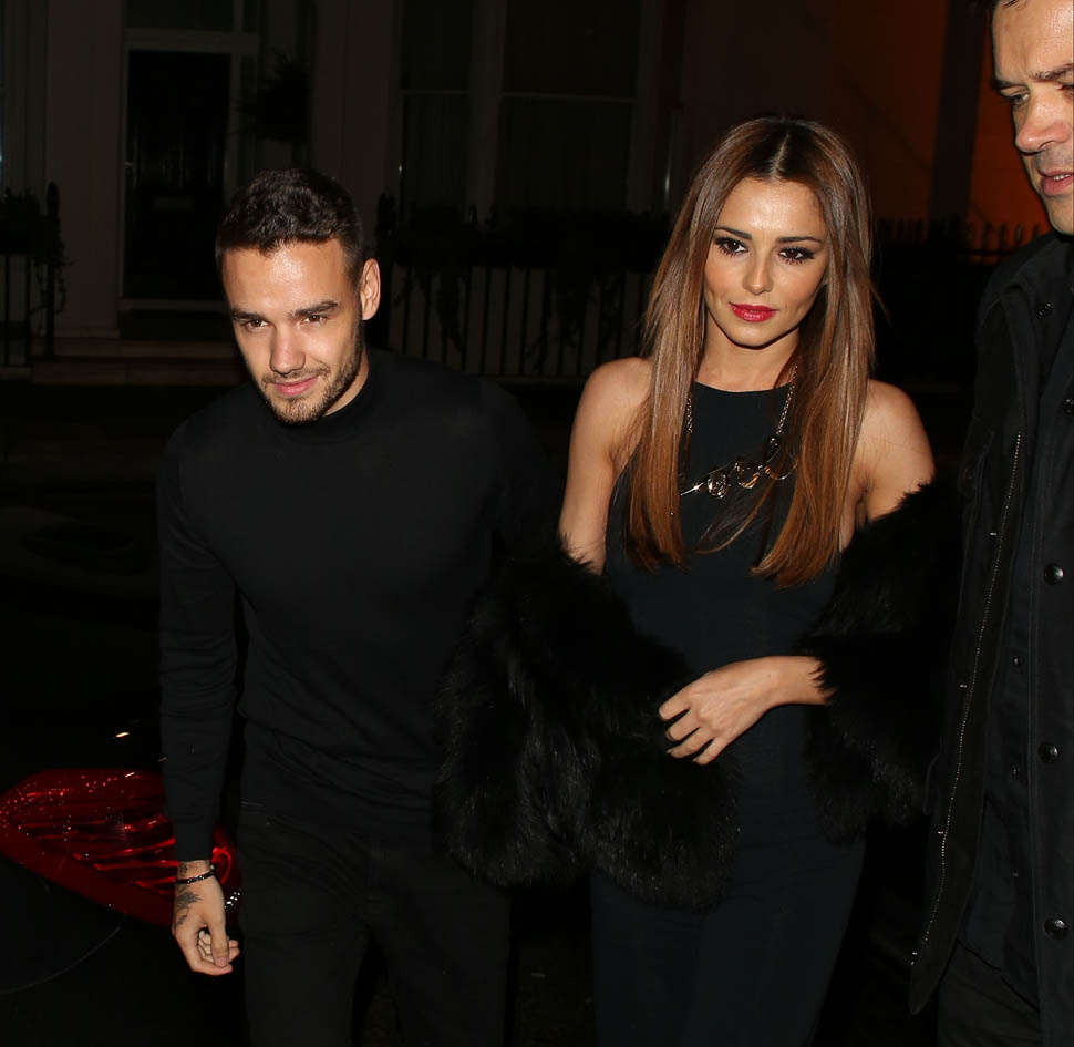 Cheryl & Liam holding hands