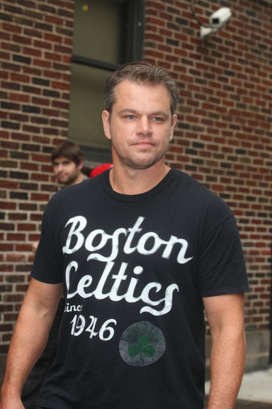 Matt Damon with Halle Berry on his lap