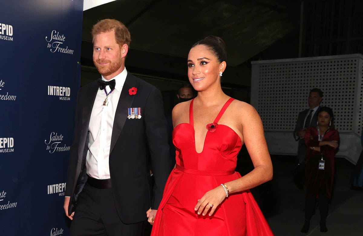 Prince Harry and Meghan Markle in red
