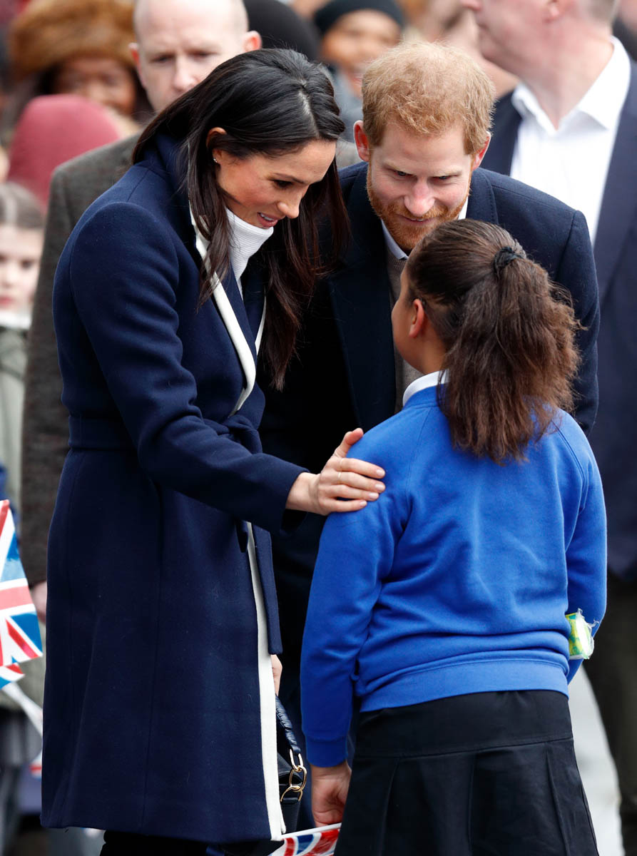 Hugging Meghan Markle