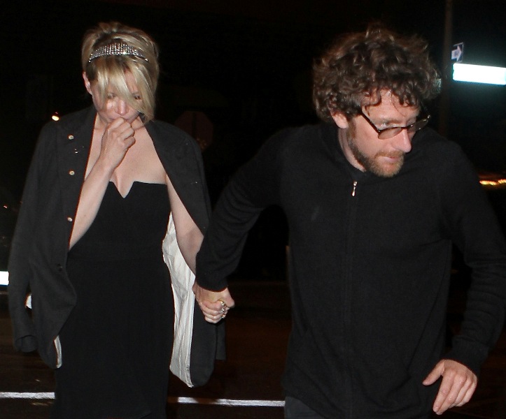 Michelle’s holding hands