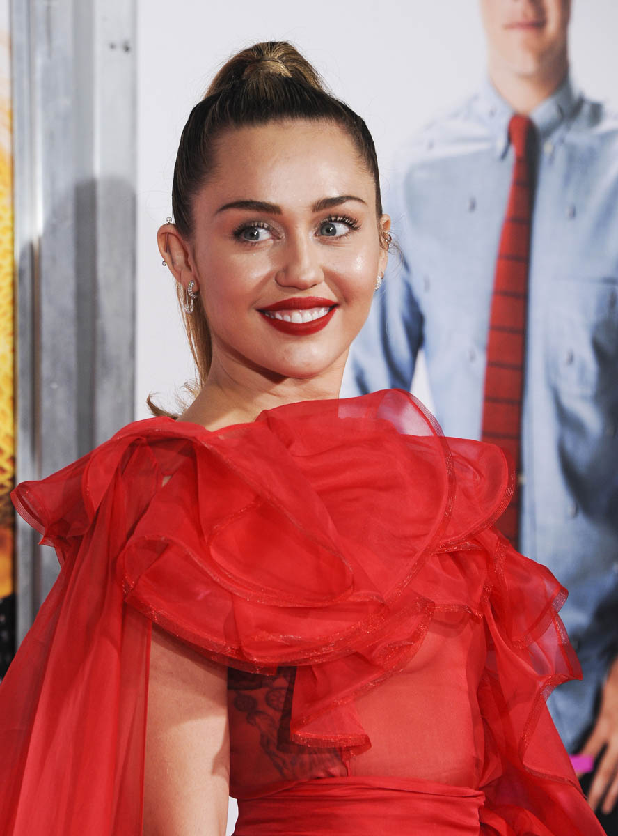 Miley’s red dress stands in for Liam