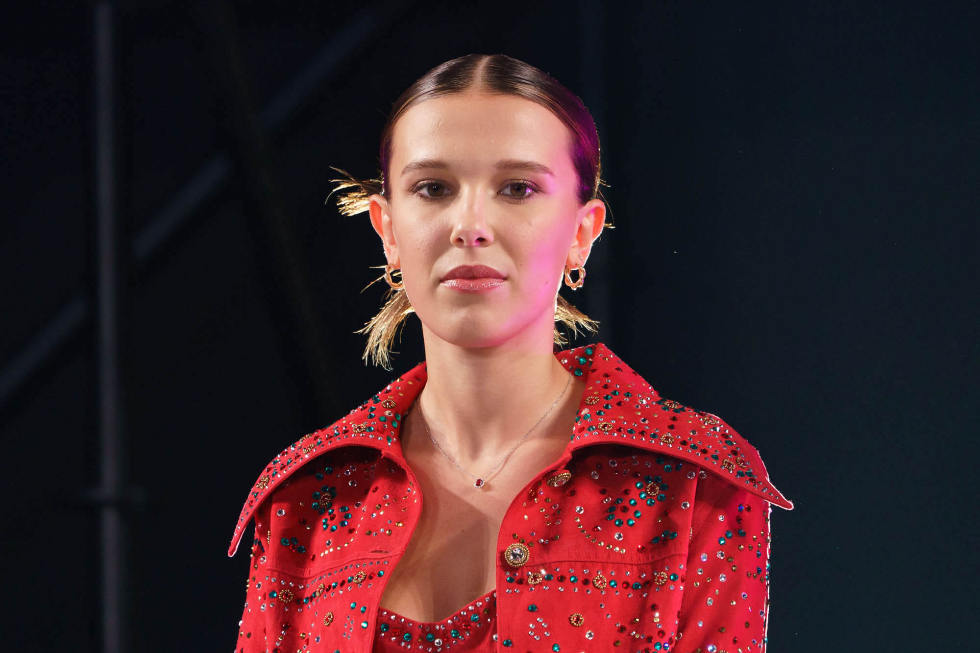 Millie Bobby Brown: the red dress on a farm