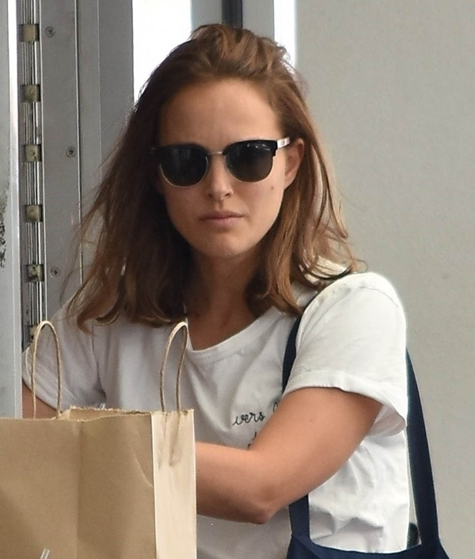 Natalie Portman and an albino alligator