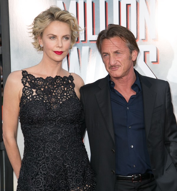 Charlize Theron’s plus one