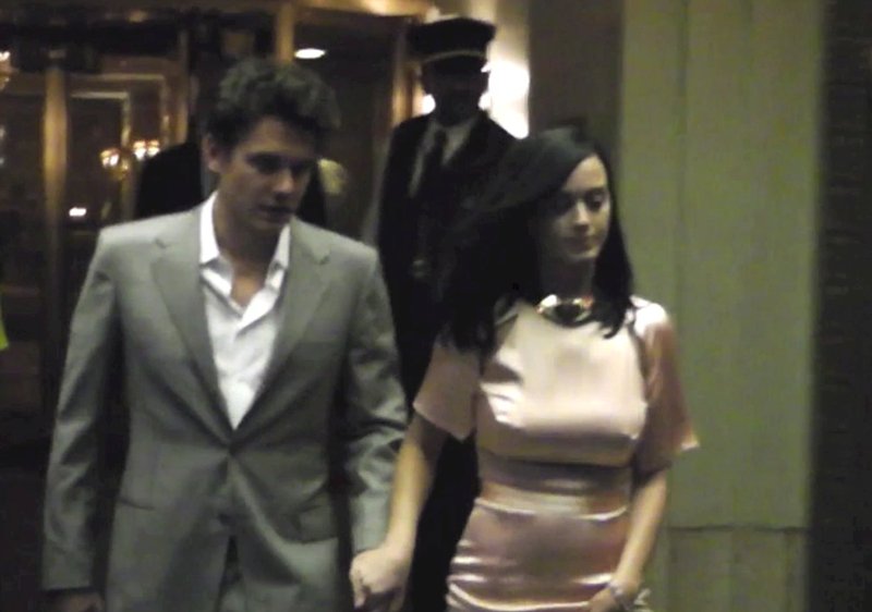 Katy holds hands with the Tortured Soul