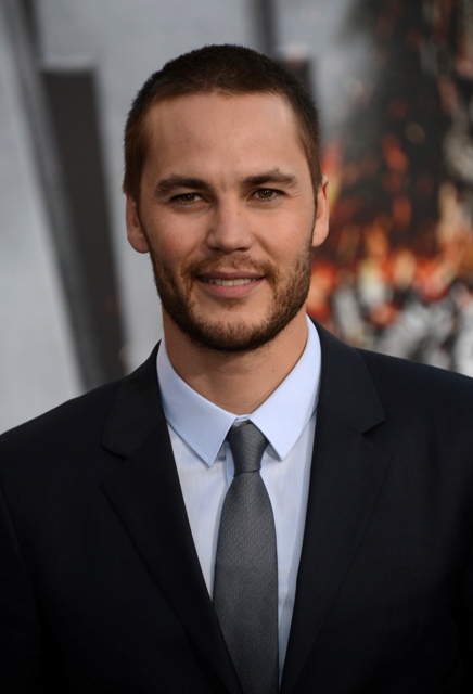 Taylor Kitsch buzzed