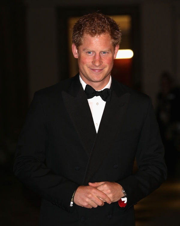 Hot Harry surrounded by women