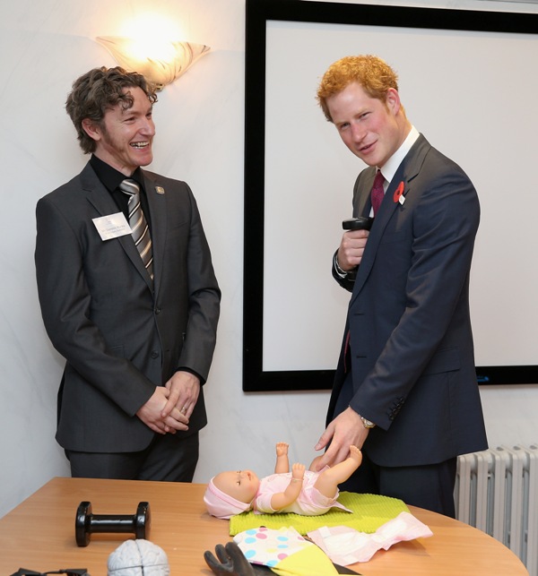 Hot Harry changing nappies