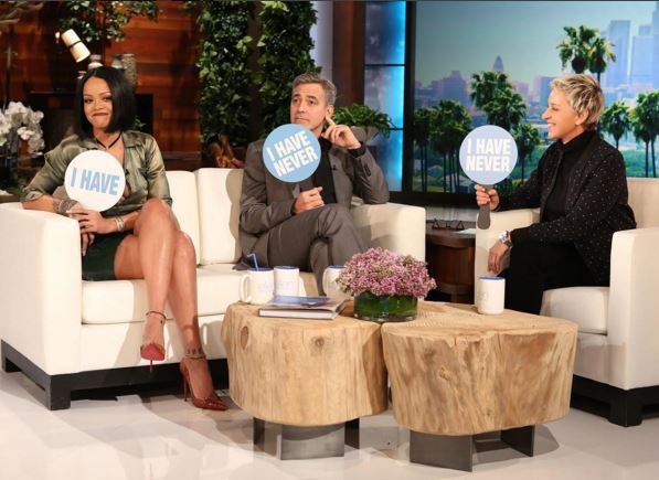 Rihanna plays with George