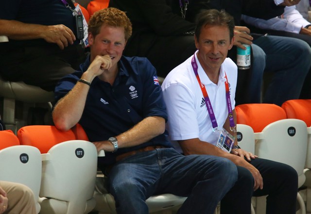 Hot Harry bites his nails while Will & Kate wave!