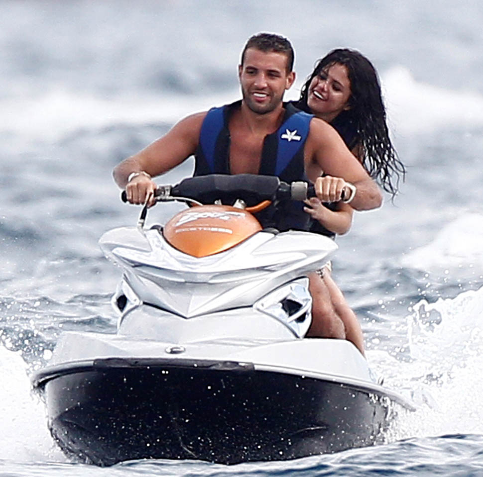 Selena with a cute guy…and Leonardo DiCaprio