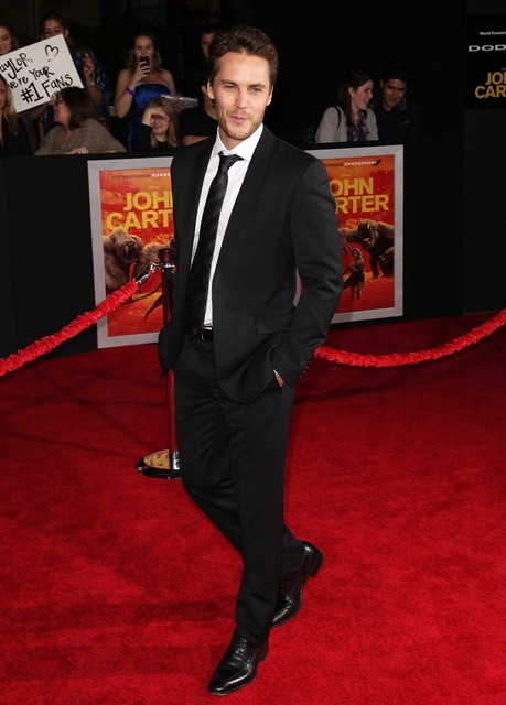 Taylor Kitsch on the carpet