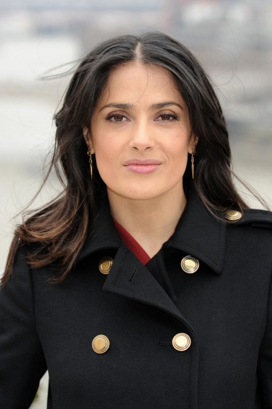 Carpets & Candids: Salma’s gold-buttoned coat